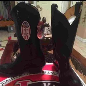 Brand new pair of Justin western Boots.